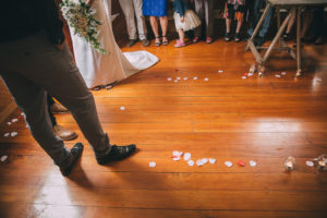 Rose petals draw out the isle at Kate and Kierans wedding